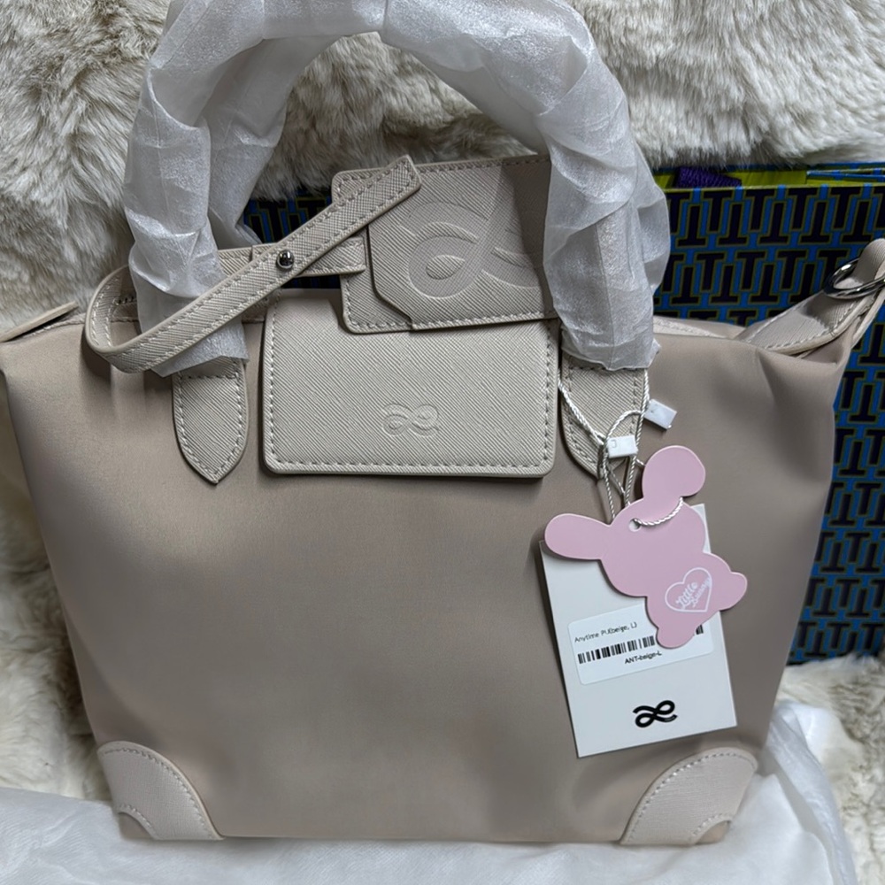 Beige Leather Satchel with Structured Design and Clean Lines